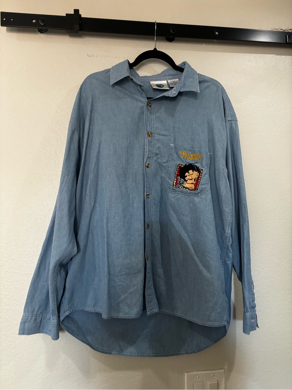 Universal Light Blue Denim Button-Down Shirt with Embroidered Pocket